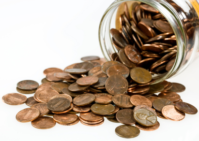 Pennies spilling from a jar 